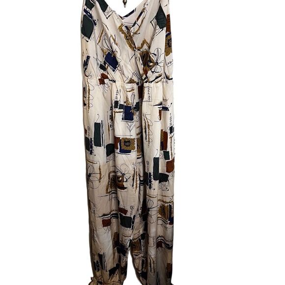 NWOT sleeveless jumpsuit. - Picture 1 of 8